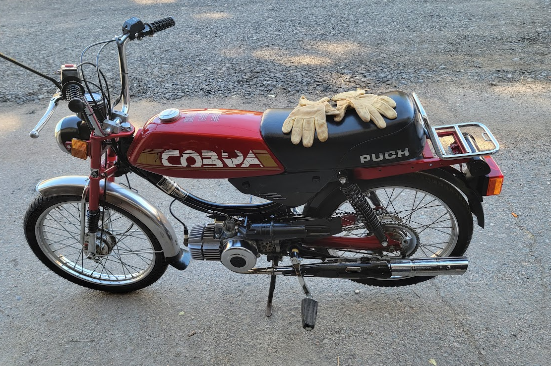 1984 Puch Cobra red, gloves on seat