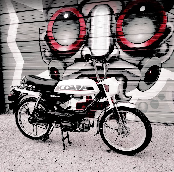 1986 Puch Cobra, mural backdrop, high-contrast edit